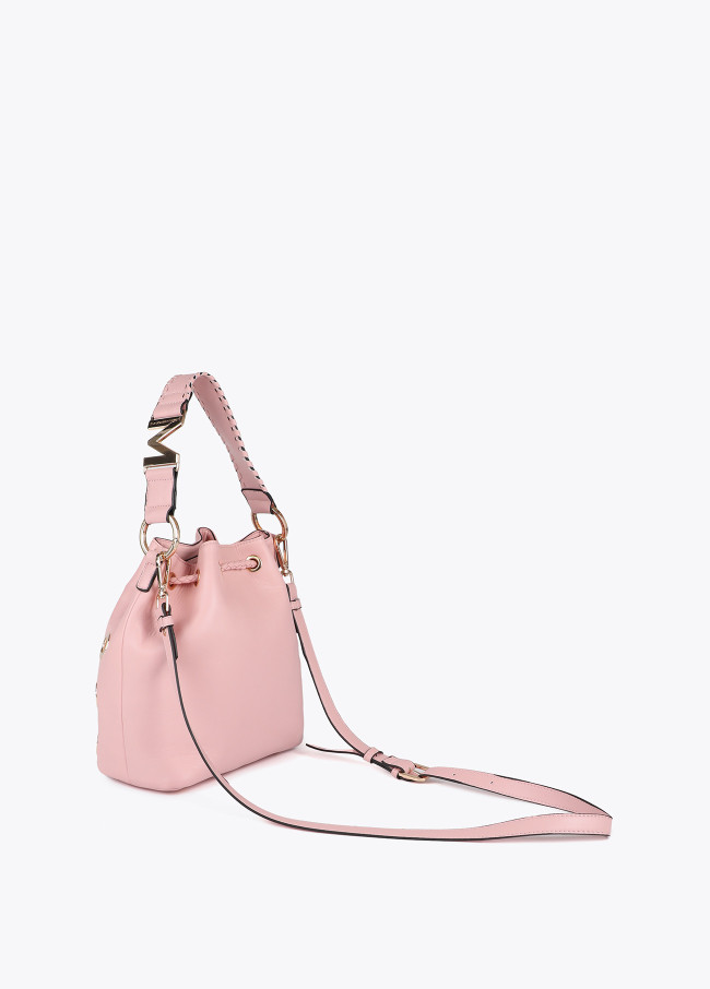 Pouch bag with circular metallic eyelets