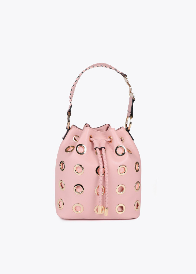 Pouch bag with circular metallic eyelets