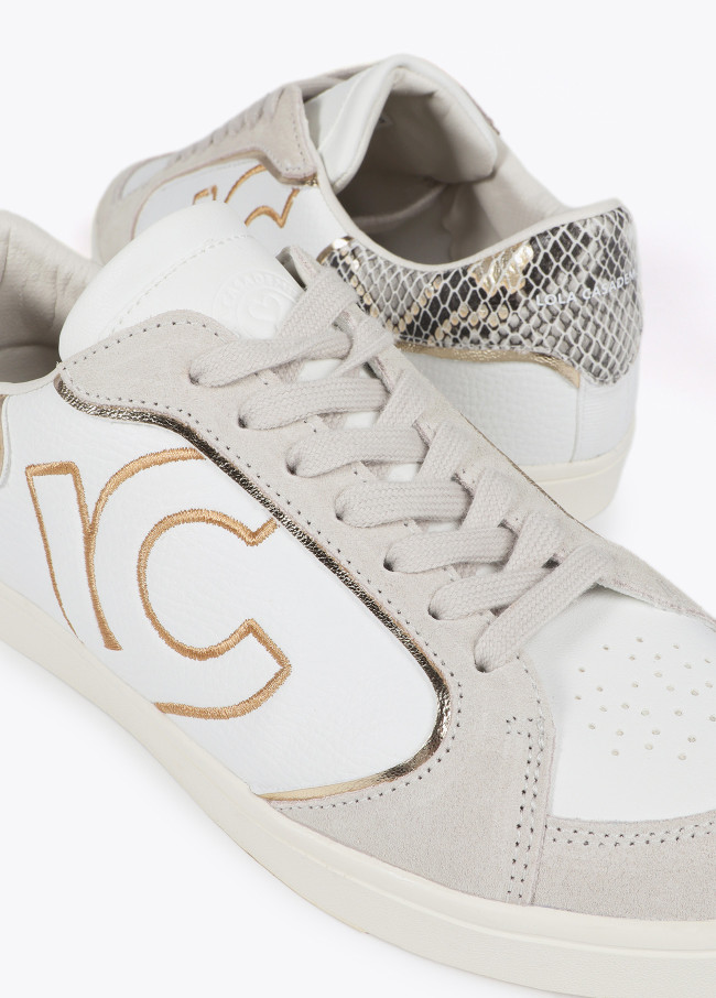 Trainers with snakeskin effect and leather details