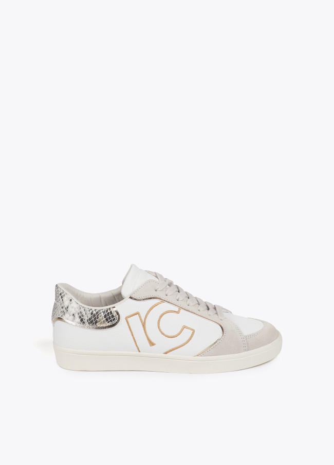 Deportiva con detalles en efecto serpiente y piel