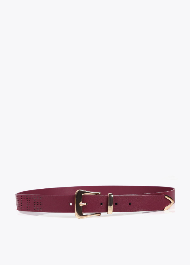 Belt with knot and cutwork logo