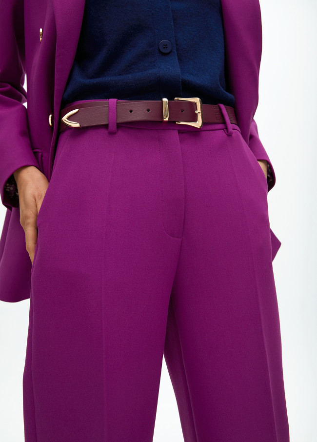 Belt with knot and cutwork logo