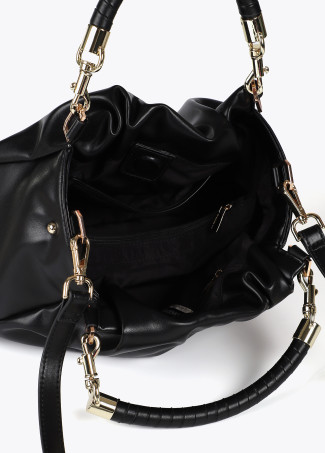 Faux leather crossbody bag with braided strap and metallic details