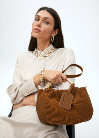 Small pleated rubberised faux leather bag with ‘”bag lovers” label