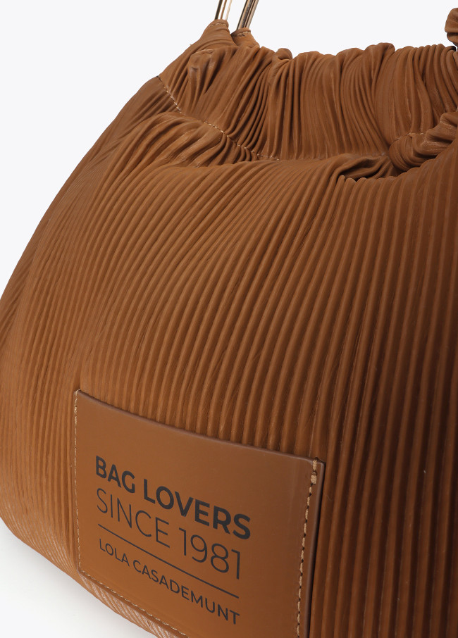 Pleated rubberised faux leather bag with ‘”bag...