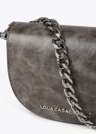 Distressed faux leather crossbody bag with flap and chain detail