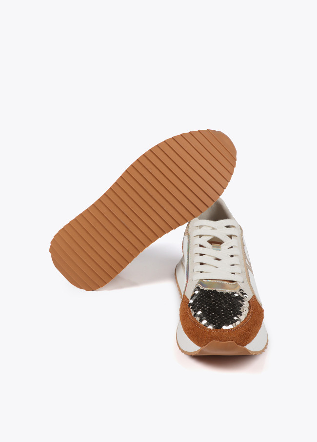 Trainers with sole in different textures and...