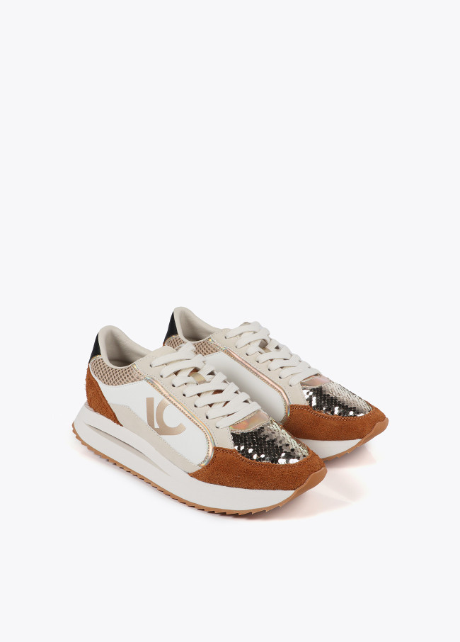 Trainers with sole in different textures and...