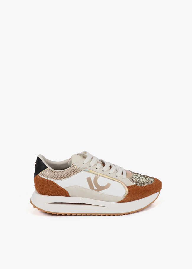 Trainers with sole in different textures and...