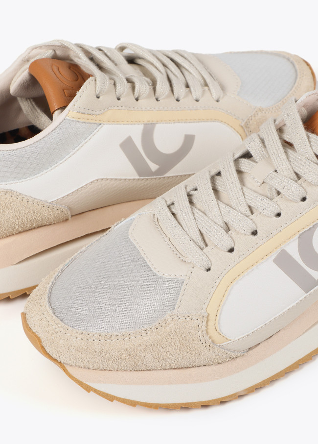 Trainers with sole in different textures and...