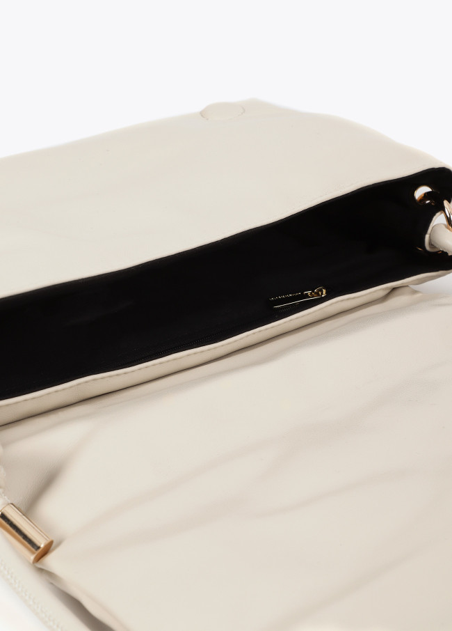 Quilted faux leather crossbody bag with round...