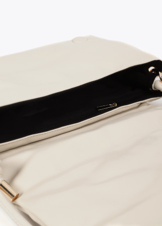 Quilted faux leather crossbody bag with round XL studs