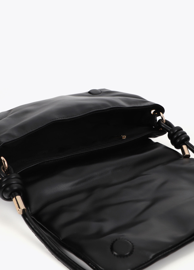 Quilted faux leather crossbody bag with round...