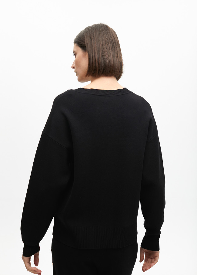 Suéter desestruturado detalhes tachas