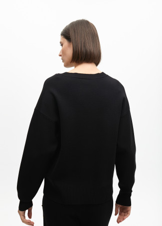 Suéter desestruturado detalhes tachas