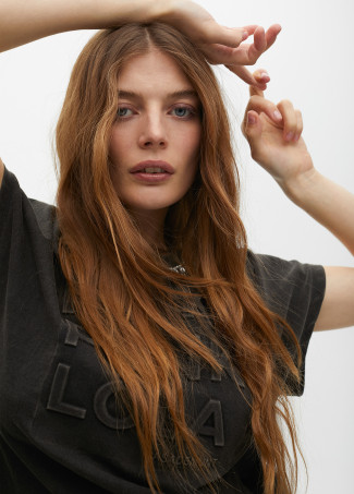 Short sleeve faded T-shirt with rhinestone neckline