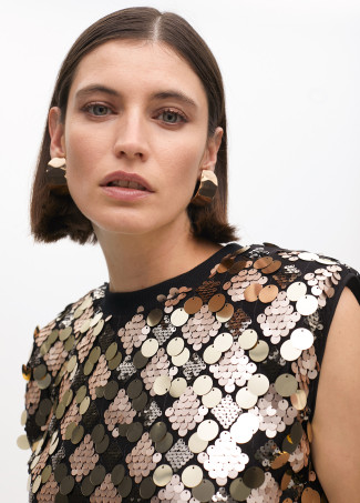 To lentejuelas doradas