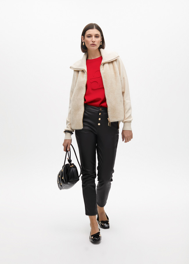 Round neck sweater with raised logo detail