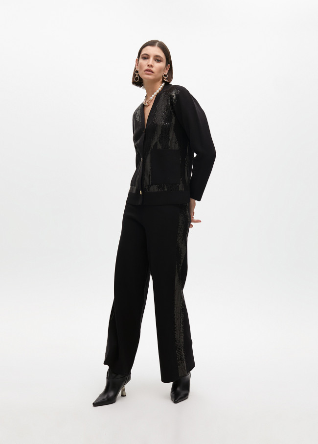 Knit trousers with side sequins