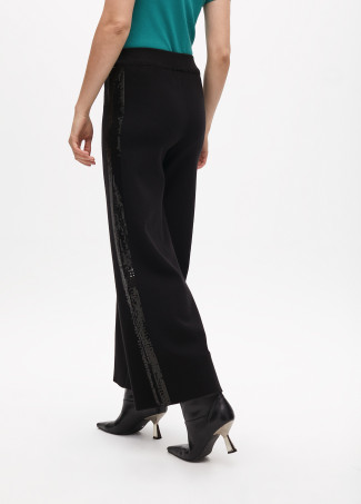 Knit trousers with side sequins