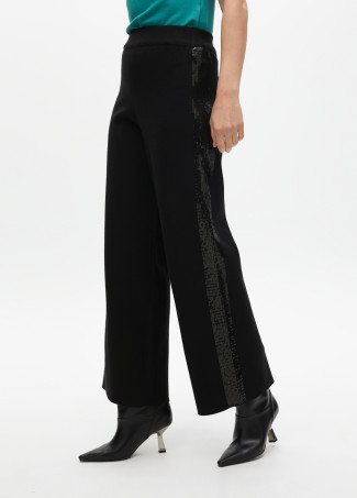 Knit trousers with side sequins