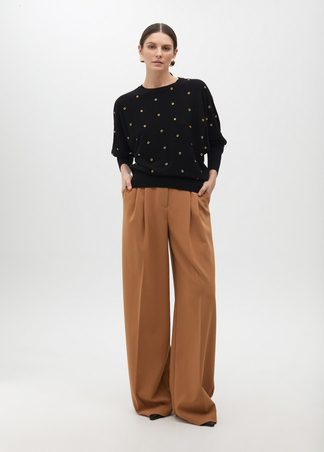 Maglione con occhielli manica cadente