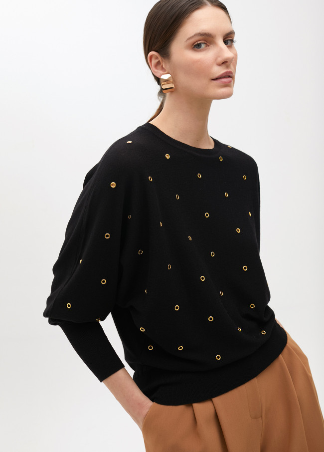 Pull avec oeillets manches tombantes