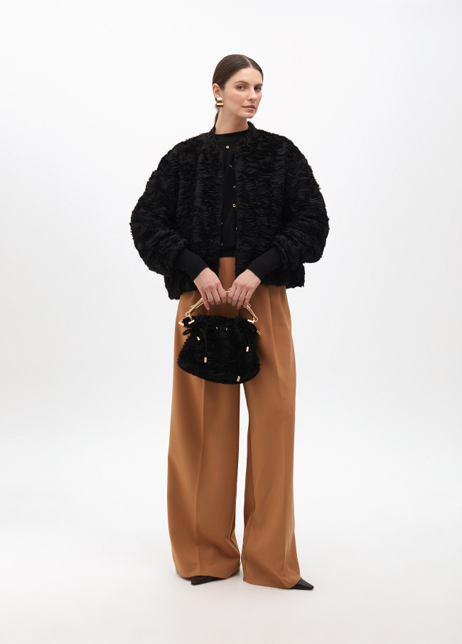 Drop sleeve sweater with eyelets