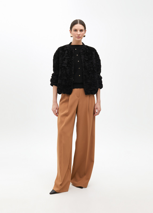 Maglione con occhielli manica cadente