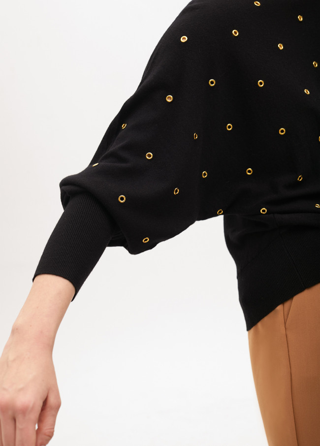Maglione con occhielli manica cadente