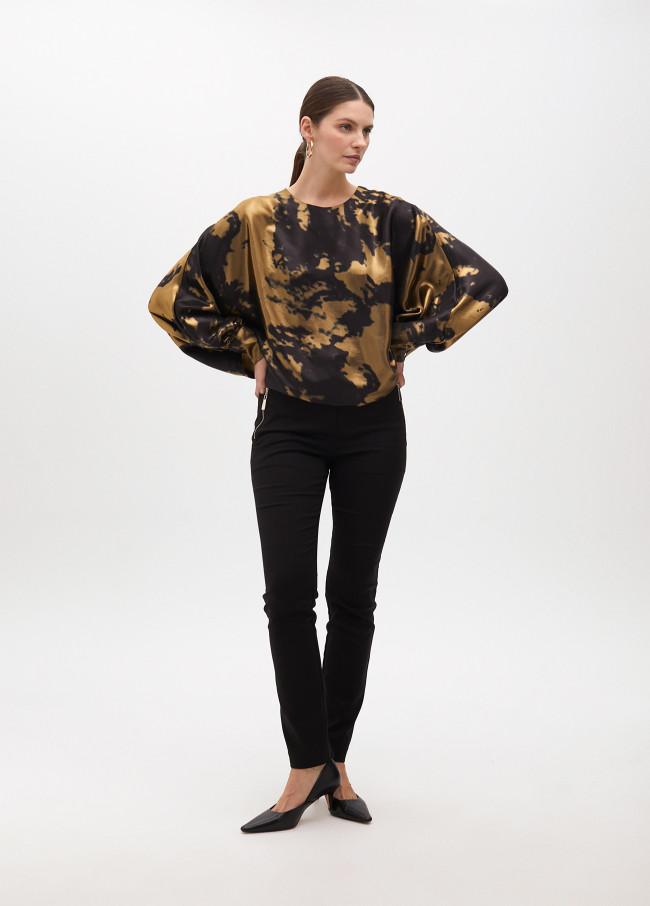 Printed blouse with asymmetric sleeves