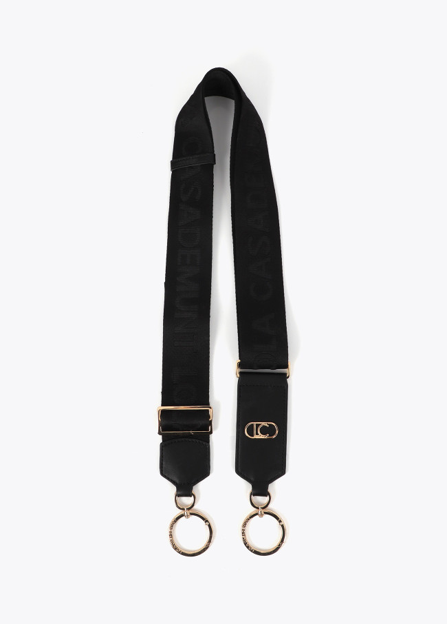Bag strap with matching logo