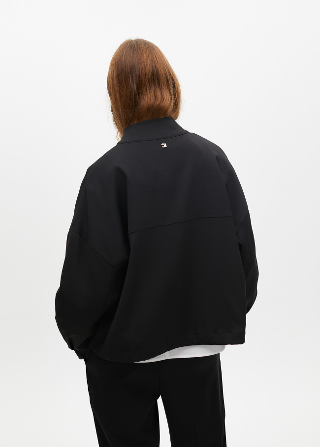 Jacket with adjustable waist