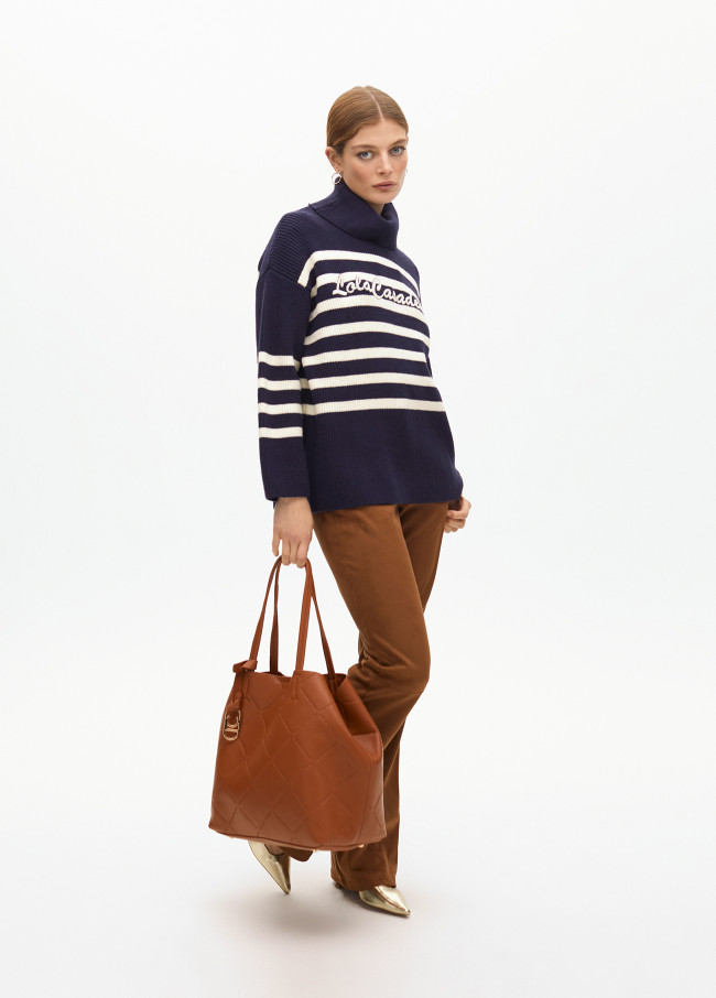 Chunky knit sweater with high neck and...