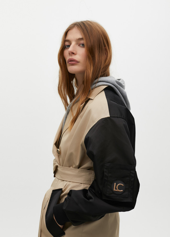 Trench coat with contrast bomber sleeves