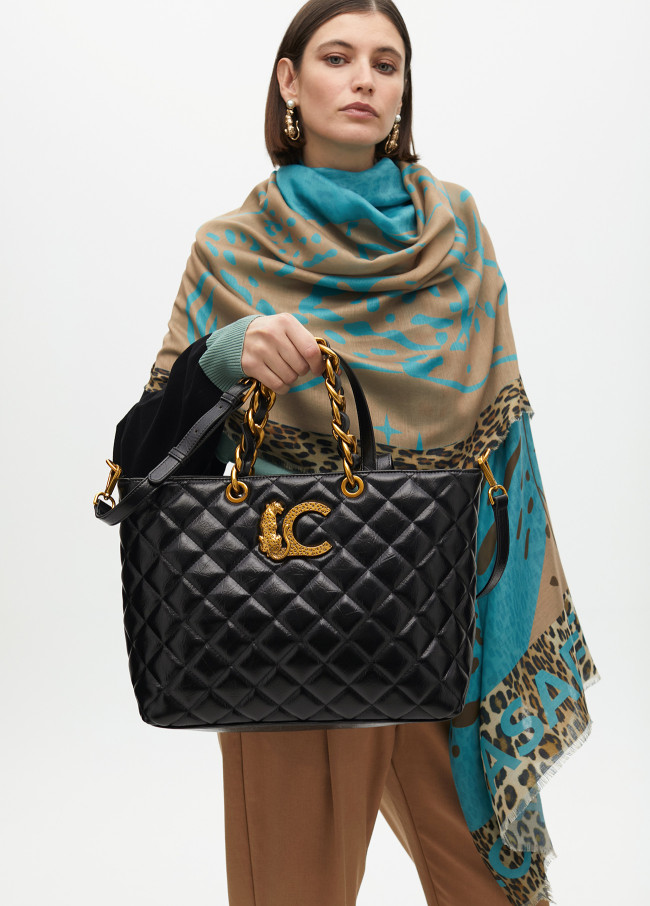 Quilted faux leather tote bag with chain strap...