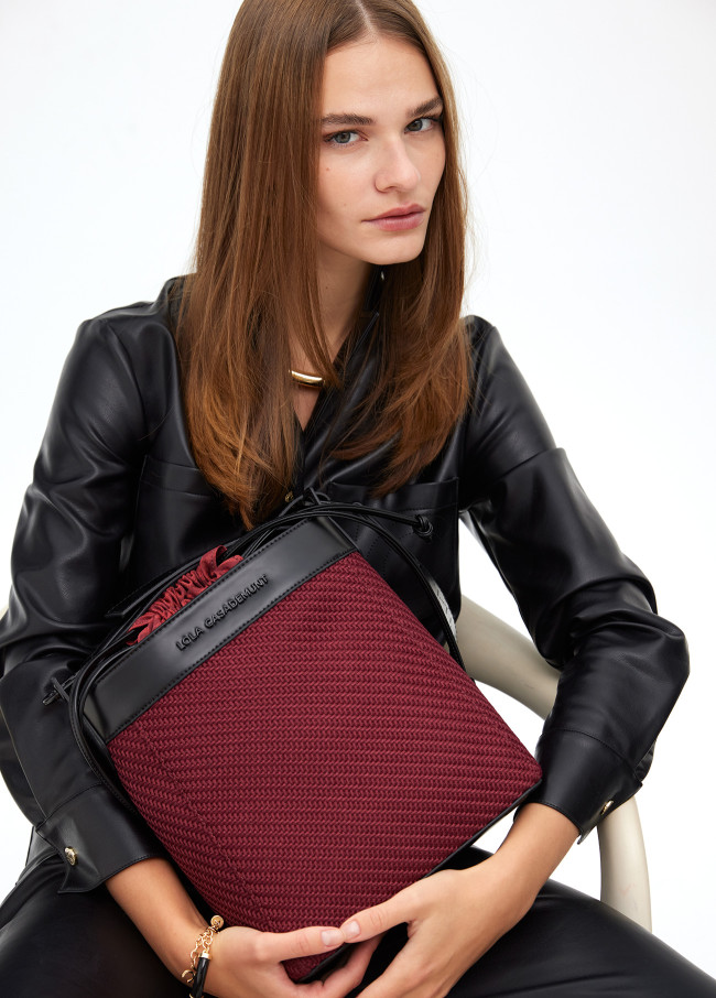 Bucket bag in contrast fabric and faux leather