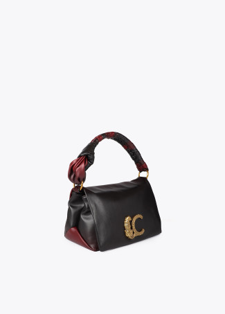 Bandolera con solapa y nudo en asa