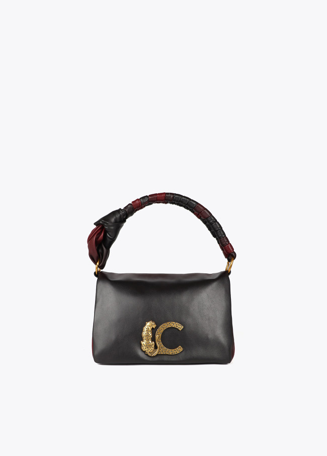Borsa a tracolla con patta e manico annodato....
