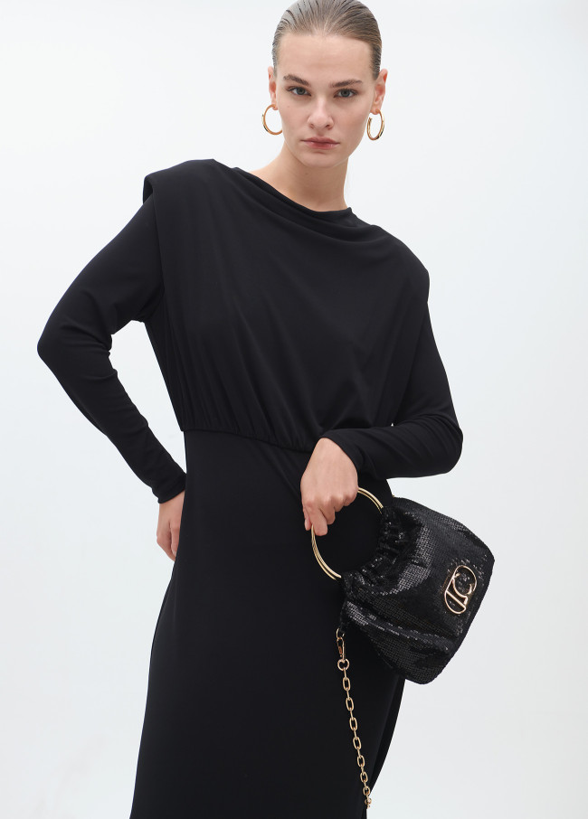 Bag in sequinned fabric with circular metallic...