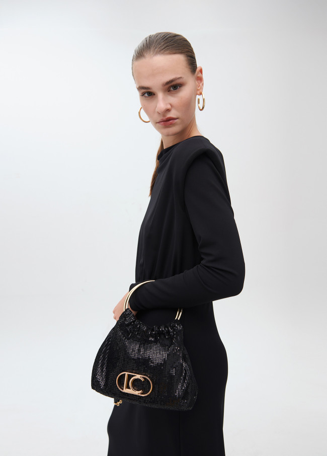 Bag in sequinned fabric with circular metallic...