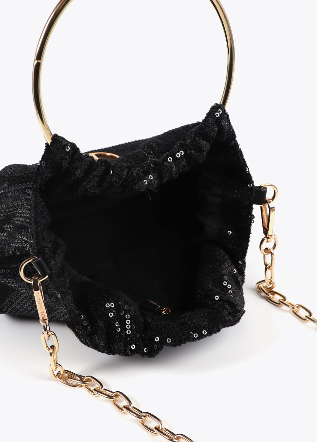 Bag in sequinned fabric with circular metallic...