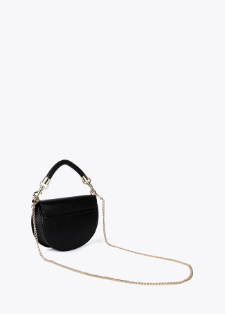 Half-moon crossbody bag with flap, short braided strap and metallic details
