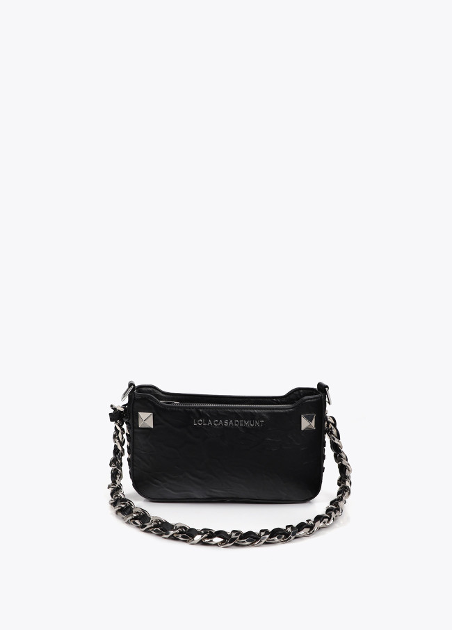 Wrinkled faux leather bag with metal details...