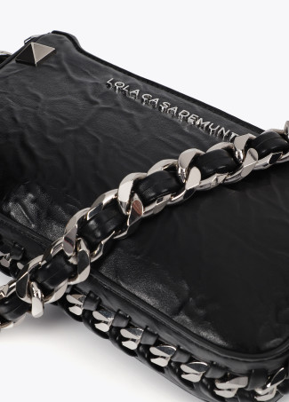 Wrinkled faux leather bag with metal details and XL studs