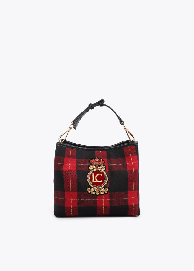 Check fabric bag with shield patch