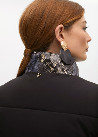 Animal print textured puffer gilet with golden details