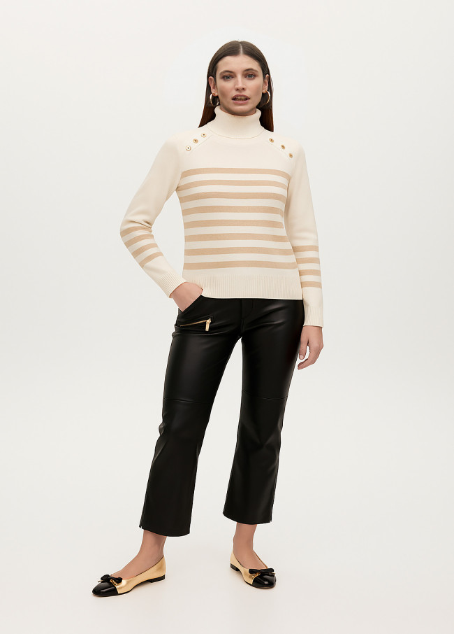 Jersey cuello alto rayas doradas con detalle...