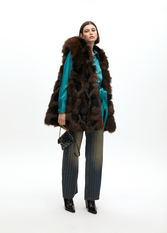 Long pile vest with interior print