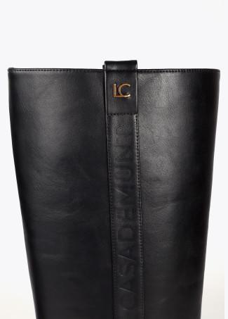 Knee-high boots with personalised strap and metallic details